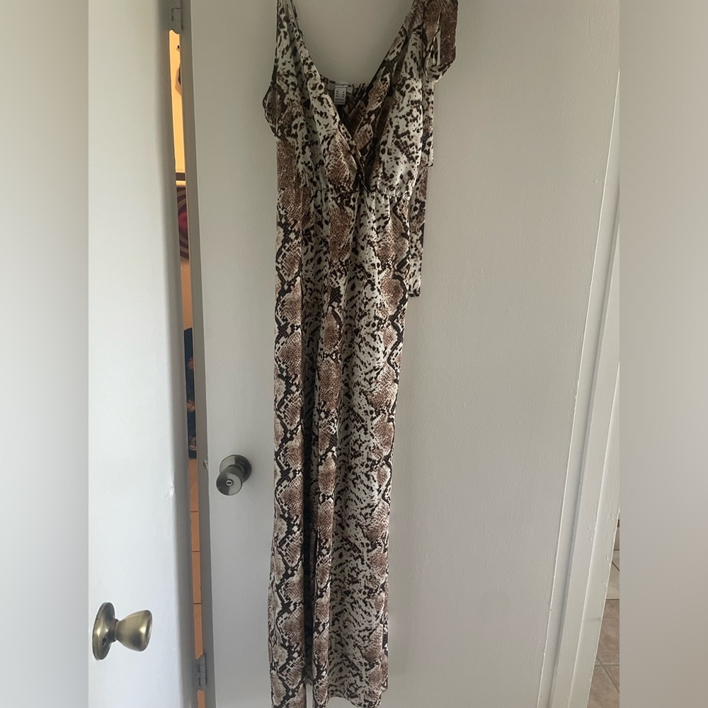Snake skin jumpsuit with tie in front. Size medium. Revamped.